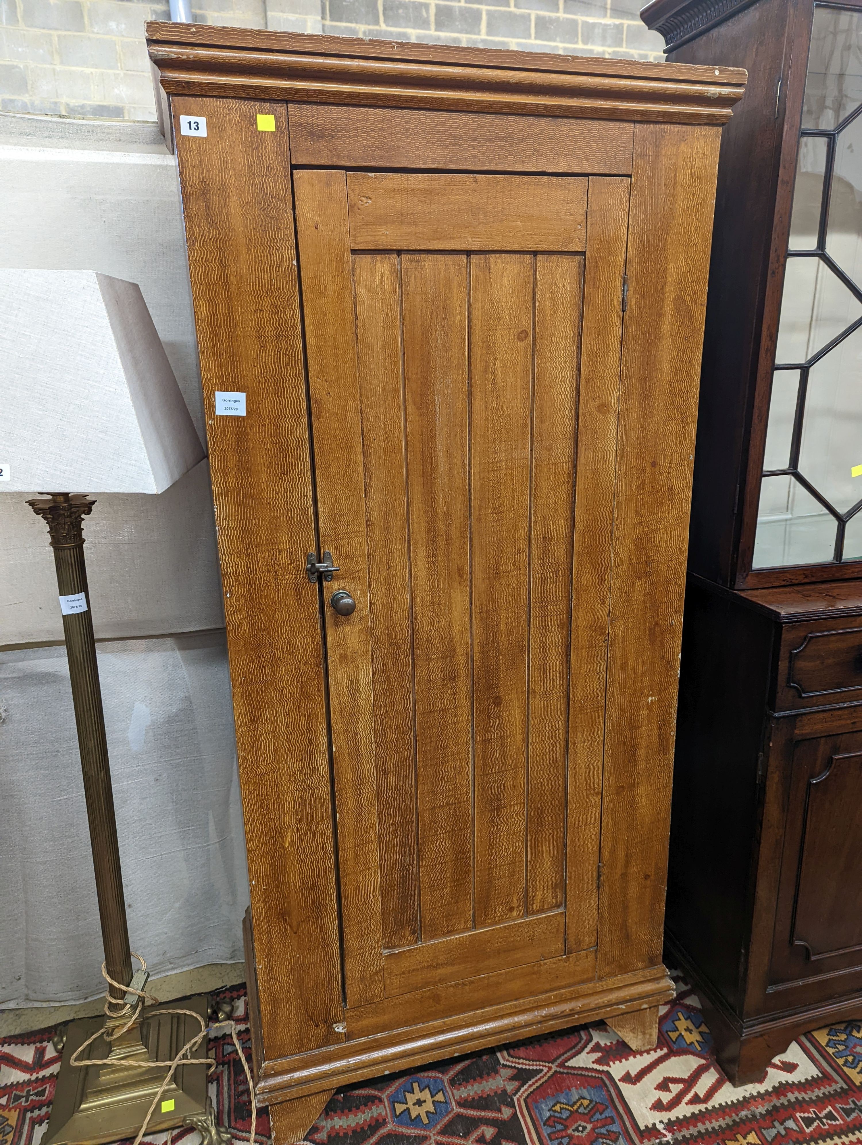 A Victorian painted grain pine hall cupboard, width 84cm, depth 44cm, height 180cm